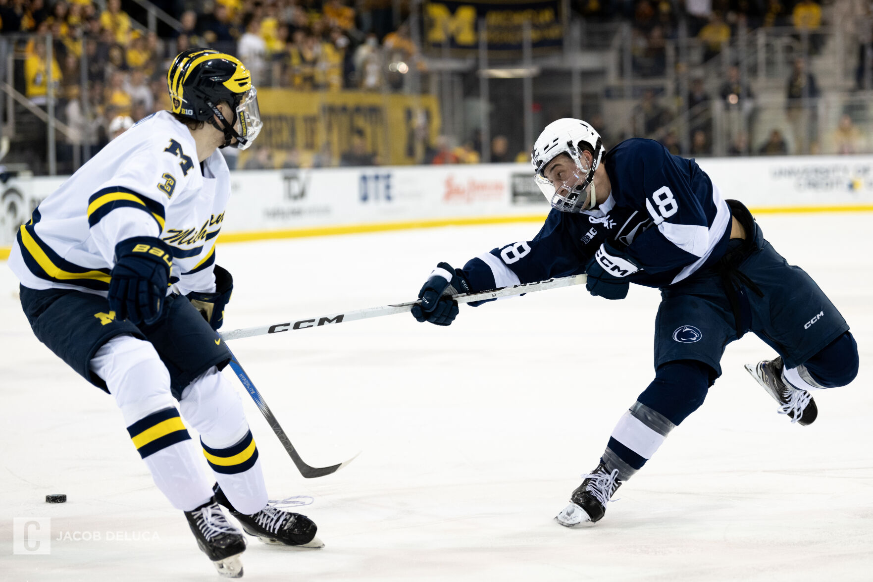 Hockey for men vs. Michigan playoff, Aiden Fink shoots